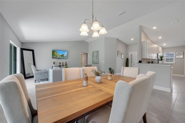 33 Peterlee Ct, Kissimmee, FL 34758 - dining area featuring light tile patterned floors, a chandelier, lofted ceiling, and recessed lighting