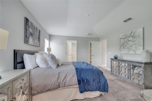 33 Peterlee Ct, Kissimmee, FL 34758 - carpeted bedroom featuring ensuite bathroom and baseboards