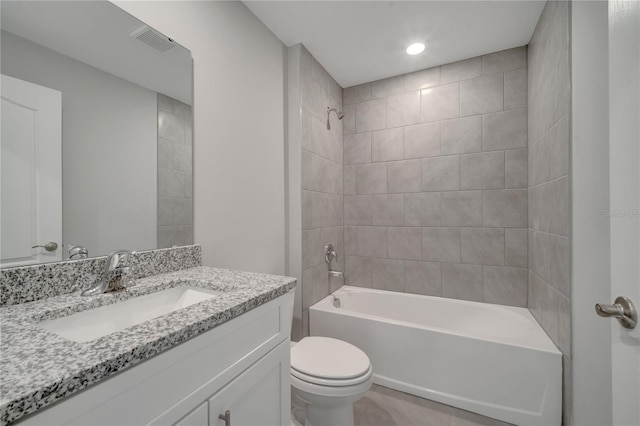 33 Peterlee Ct, Kissimmee, FL 34758 - bathroom with vanity,  shower combination, tile patterned floors, and recessed lighting