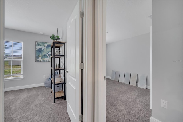 33 Peterlee Ct, Kissimmee, FL 34758 - corridor featuring carpet and baseboards