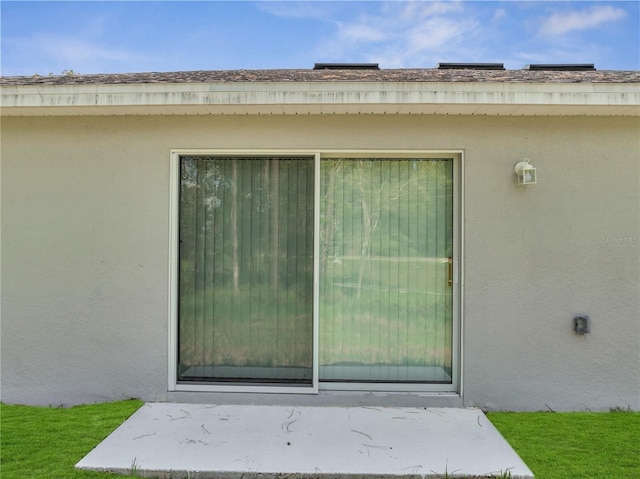 33 Peterlee Ct, Kissimmee, FL 34758 - entrance to property featuring stucco siding
