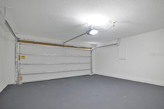 303 Anchovie Ct, Poinciana, FL 34759 - garage with a garage door opener