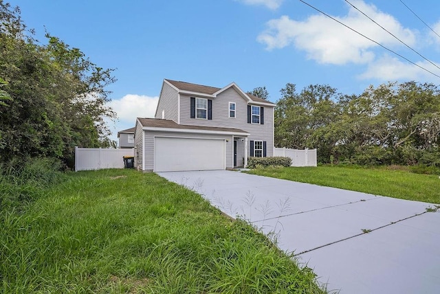 303 Anchovie Ct, Poinciana, FL 34759 - view of front facade with driveway and an attached garage