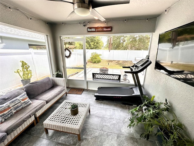 144 Foxtail Loop, Davenport, FL 33837 - sunroom featuring ceiling fan and outdoor lounge area