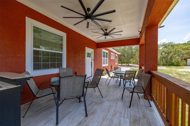 2576 R E Byrd Rd, Frostproof, FL 33843 - view of patio with outdoor dining area and ceiling fan