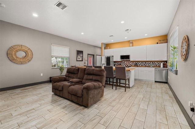 2576 R E Byrd Rd, Frostproof, FL 33843 - living area with recessed lighting and light wood-style flooring