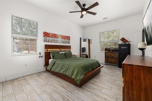 2576 R E Byrd Rd, Frostproof, FL 33843 - bedroom with baseboards and ceiling fan