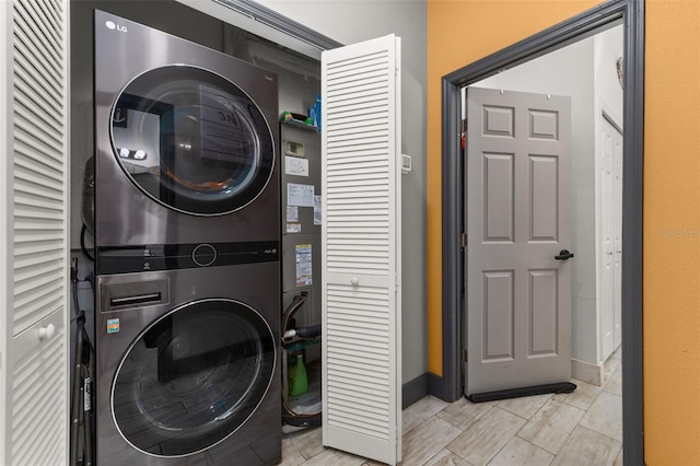 2576 R E Byrd Rd, Frostproof, FL 33843 - laundry area with stacked washer / drying machine