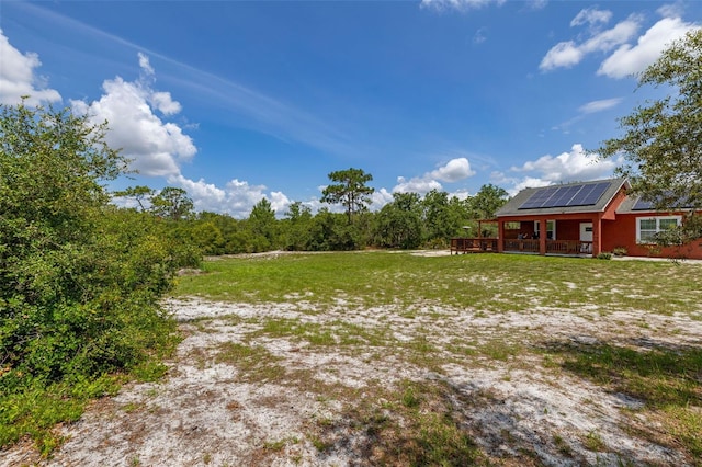2576 R E Byrd Rd, Frostproof, FL 33843 - view of yard with a deck