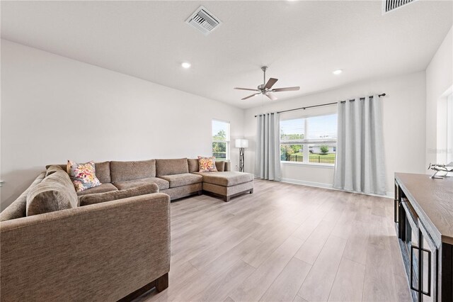 7413 Bent Tree Loop, Saint Cloud, FL 34771 - living room with a ceiling fan, light wood-style floors, and recessed lighting