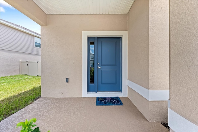 7413 Bent Tree Loop, Saint Cloud, FL 34771 - doorway to property featuring stucco siding