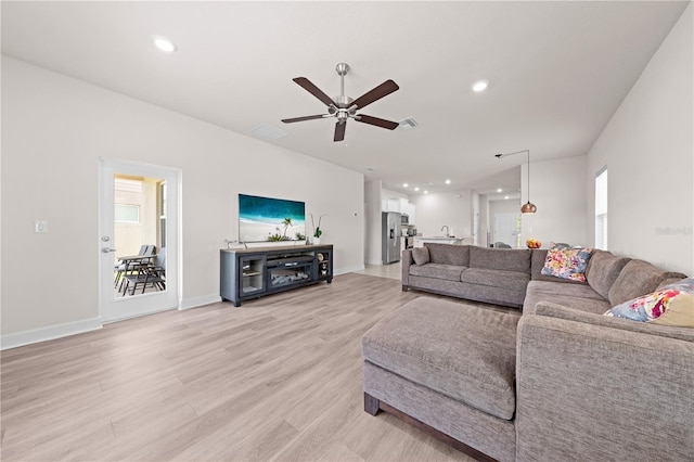 7413 Bent Tree Loop, Saint Cloud, FL 34771 - living room featuring a ceiling fan, light wood-style flooring, and recessed lighting