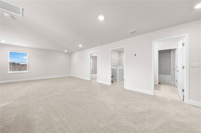 7413 Bent Tree Loop, Saint Cloud, FL 34771 - empty room featuring separate washer and dryer, light carpet, and recessed lighting