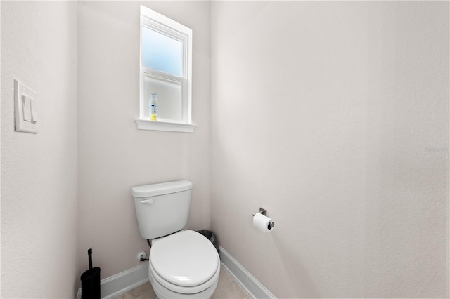 7413 Bent Tree Loop, Saint Cloud, FL 34771 - bathroom with baseboards and toilet
