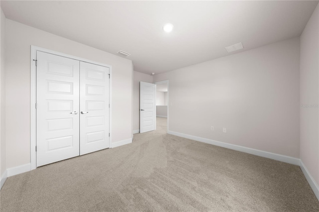 7413 Bent Tree Loop, Saint Cloud, FL 34771 - unfurnished bedroom featuring carpet flooring and a closet