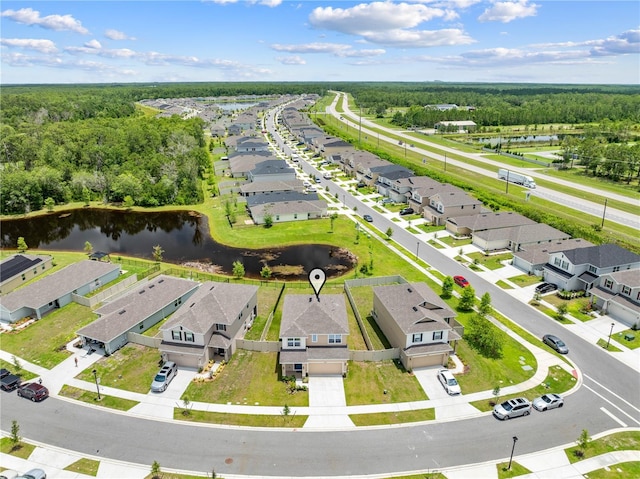 7413 Bent Tree Loop, Saint Cloud, FL 34771 - aerial perspective of suburban area with a nearby body of water and a forest