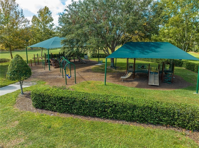 7413 Bent Tree Loop, Saint Cloud, FL 34771 - community jungle gym featuring a yard