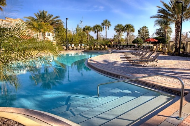 4862 Cayview Ave Unit 40409, Orlando, FL 32819 - community pool with a patio