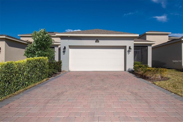 11051 Bostwick Aly, Winter Garden, FL 34787 - single story home with stucco siding, decorative driveway, and a garage