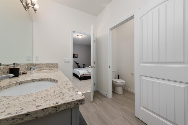 11051 Bostwick Aly, Winter Garden, FL 34787 - ensuite bathroom featuring double vanity and toilet