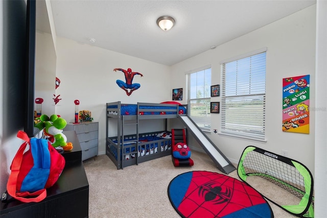 11051 Bostwick Aly, Winter Garden, FL 34787 - bedroom with carpet floors and baseboards
