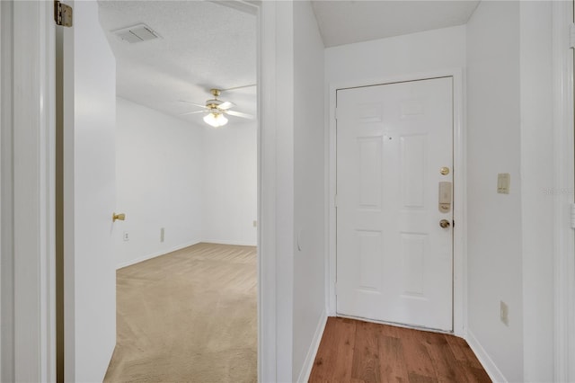 3205 Sabal Palms Ct Unit A, Kissimmee, FL 34747 - corridor with baseboards and wood finished floors