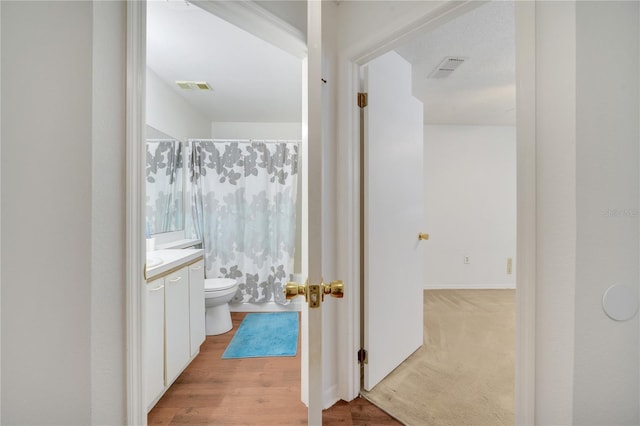 3205 Sabal Palms Ct Unit A, Kissimmee, FL 34747 - hallway featuring light wood-style floors