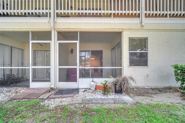 3205 Sabal Palms Ct Unit A, Kissimmee, FL 34747 - property entrance with a balcony and stucco siding