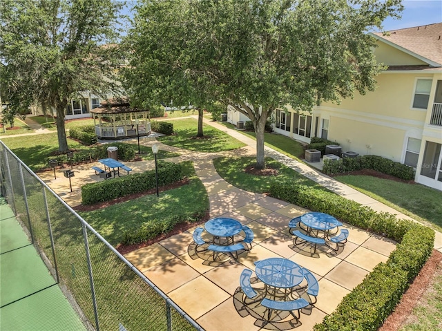 3205 Sabal Palms Ct Unit A, Kissimmee, FL 34747 - surrounding community featuring a patio and a gazebo