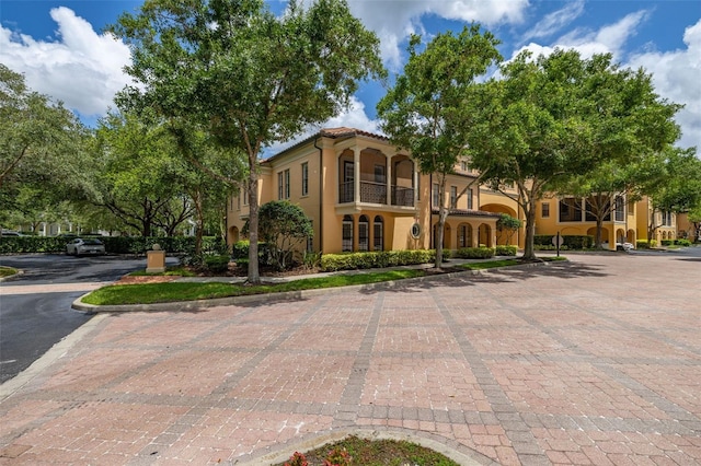 502 Mirasol Cir Unit 103, Kissimmee, FL 34747 - mediterranean / spanish-style house featuring stucco siding