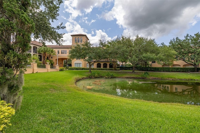 502 Mirasol Cir Unit 103, Kissimmee, FL 34747 - view of community featuring a yard