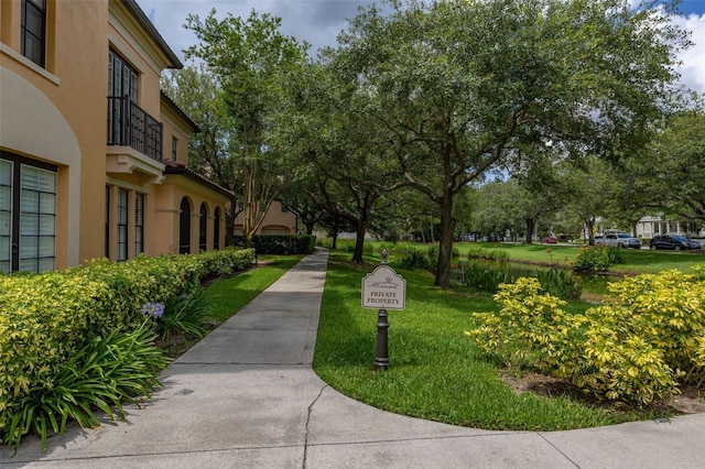 502 Mirasol Cir Unit 103, Kissimmee, FL 34747 - view of community featuring a yard
