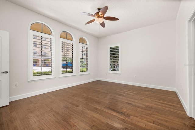 502 Mirasol Cir Unit 103, Kissimmee, FL 34747 - unfurnished room with ceiling fan and dark wood finished floors