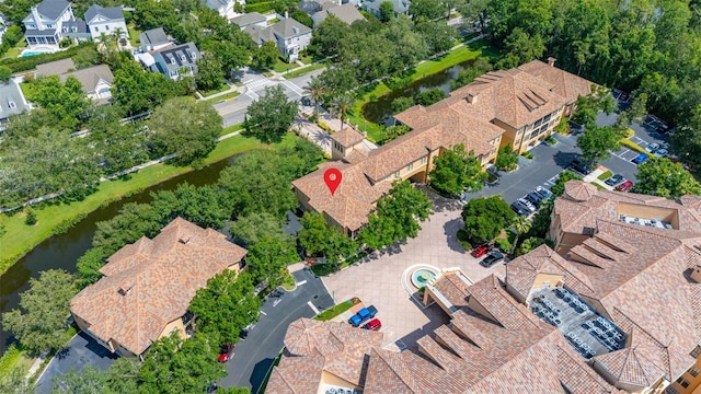 502 Mirasol Cir Unit 103, Kissimmee, FL 34747 - aerial view of residential area with a large body of water