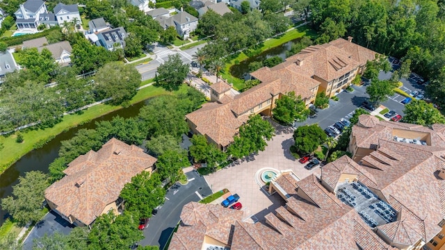 502 Mirasol Cir Unit 103, Kissimmee, FL 34747 - aerial perspective of suburban area featuring a large body of water