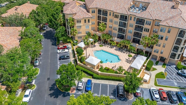 502 Mirasol Cir Unit 103, Kissimmee, FL 34747 - drone / aerial view of a pool area
