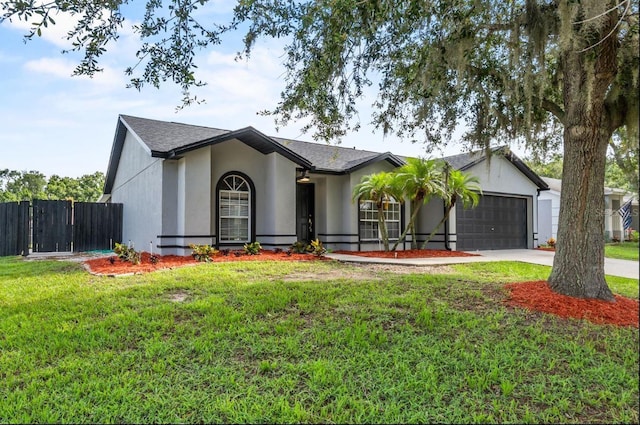 6528 Shepherd Oaks Pass, Lakeland, FL 33811 - single story home with an attached garage, concrete driveway, and stucco siding
