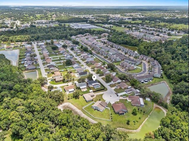 6528 Shepherd Oaks Pass, Lakeland, FL 33811 - aerial overview of property's location with a large body of water and nearby suburban area