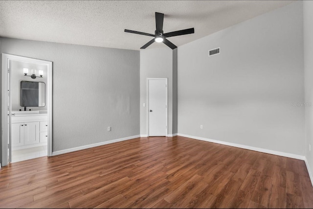 6528 Shepherd Oaks Pass, Lakeland, FL 33811 - unfurnished room featuring wood finished floors, ceiling fan, and a textured ceiling