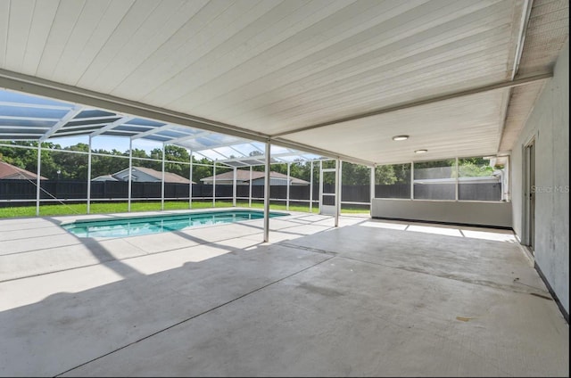 6528 Shepherd Oaks Pass, Lakeland, FL 33811 - view of pool with a patio area, a storage shed, a fenced backyard, and a lanai