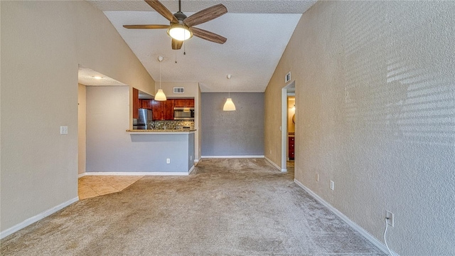 5112 Conroy Rd Unit 24, Orlando, FL 32811 - unfurnished living room with a ceiling fan, carpet, and a textured ceiling