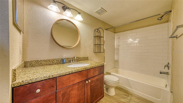 5112 Conroy Rd Unit 24, Orlando, FL 32811 - bathroom with a textured wall, vanity, shower / washtub combination, and a textured ceiling