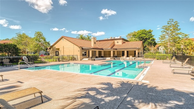 5112 Conroy Rd Unit 24, Orlando, FL 32811 - community pool with a patio area