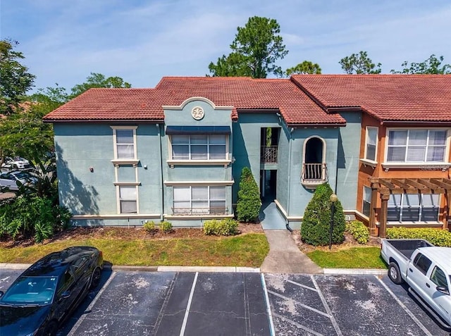 5112 Conroy Rd Unit 24, Orlando, FL 32811 - view of property with uncovered parking