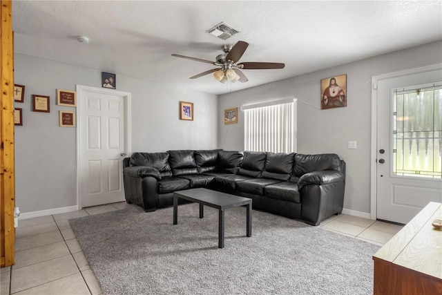1 Coyer Rd, Haines City, FL 33844 - living area with light tile patterned floors and ceiling fan