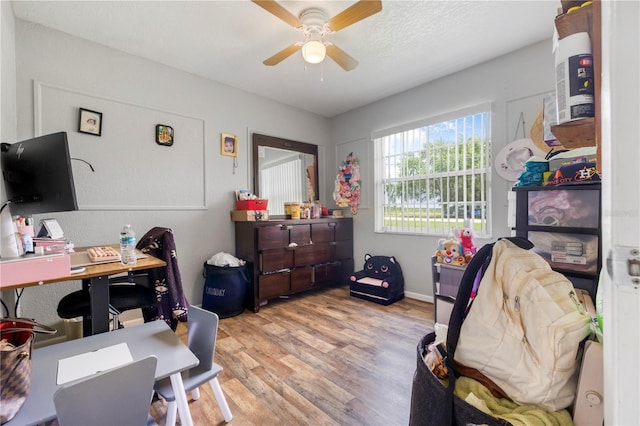 1 Coyer Rd, Haines City, FL 33844 - office area with ceiling fan and wood finished floors