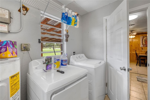 1 Coyer Rd, Haines City, FL 33844 - laundry area with water heater, independent washer and dryer, light tile patterned flooring, and a ceiling fan