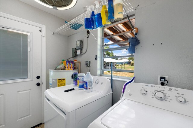1 Coyer Rd, Haines City, FL 33844 - laundry room with independent washer and dryer and water heater