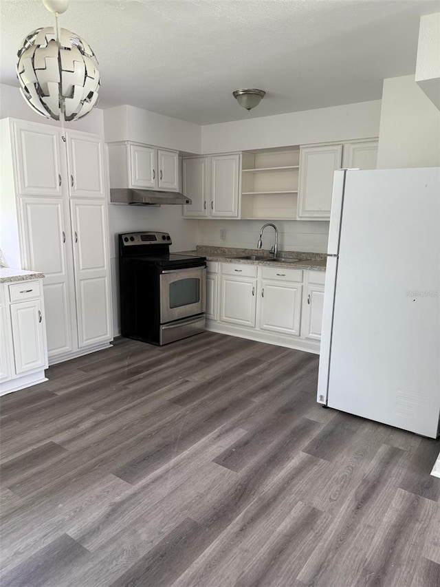 5449 NW 2nd St, Ocala, FL 34482 - kitchen featuring freestanding refrigerator, stainless steel range with electric stovetop, under cabinet range hood, open shelves, and white cabinetry