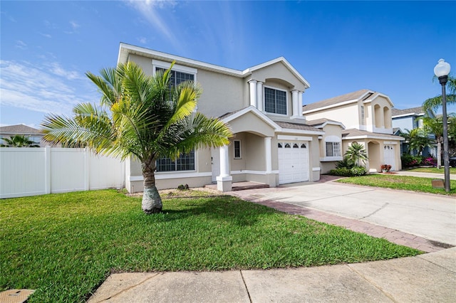 1101 Sandestin Way, Orlando, FL 32824 - view of front facade featuring a garage, stucco siding, and concrete driveway